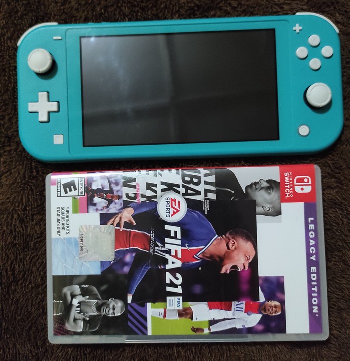 CLEAN Used Nintendo Switch Lite With FIFA21 - Video Games And Gadgets For  Sale - Nigeria