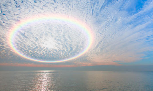 Ring with store rainbow inside