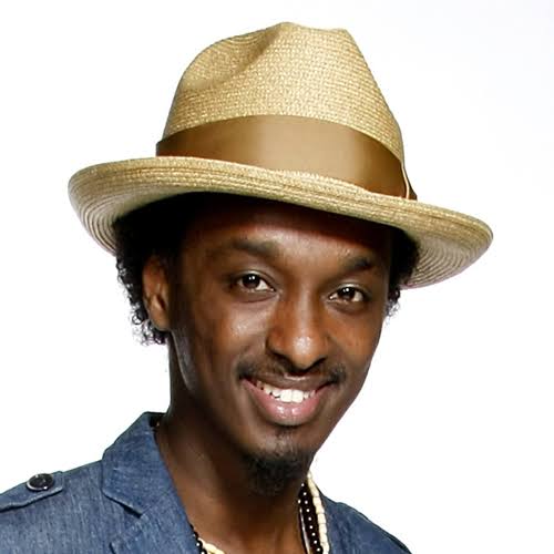 K naan wavin flag. K'Naan. K'Naan Warsame. K'Naan Troubadour.