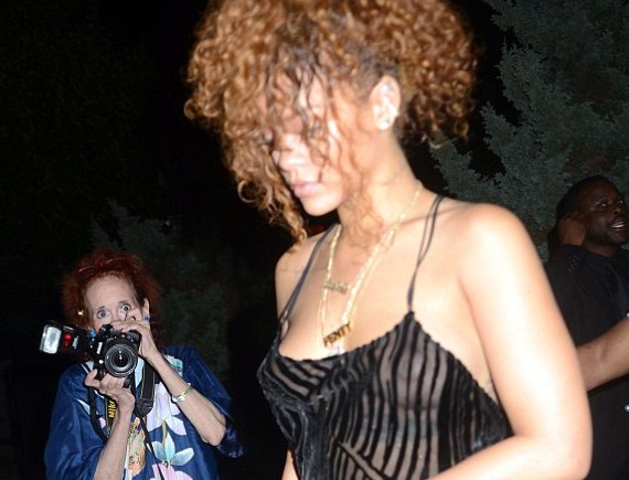 Rihanna goes braless, flashes nipples!