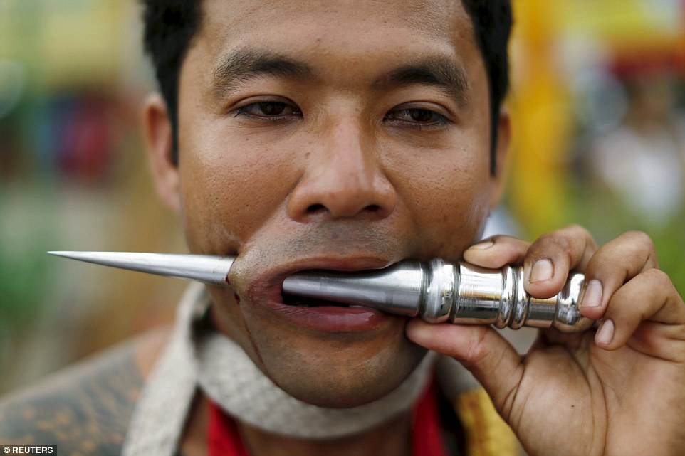 Thai Men Force Sharp Spikes, Huge Knives And The Guns Through