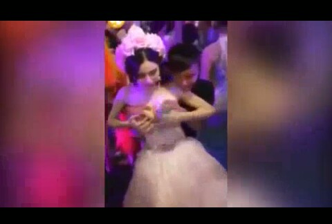 Bride lets guests pay money to touch her breasts in bizarre Chinese wedding  custom