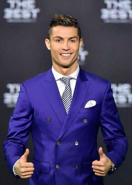 Cristiano Ronaldo Poses With His Fifa Best Player Award