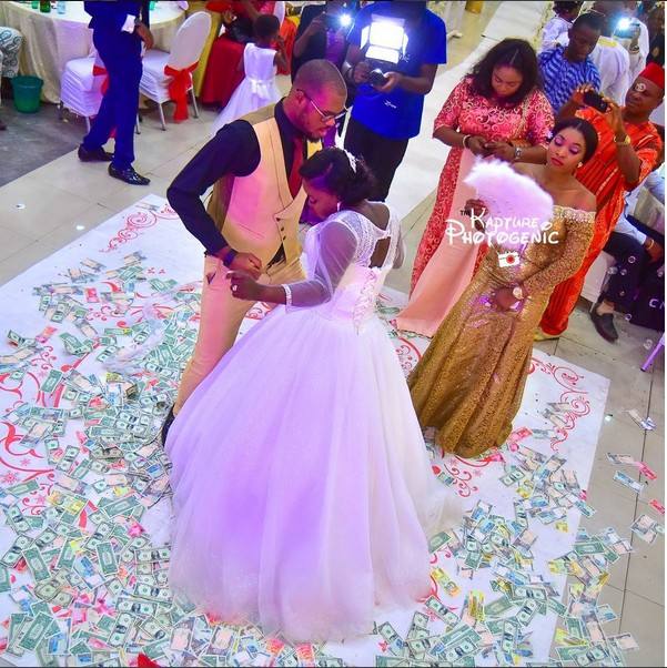 Check Out The Dollar Rain Experienced At A Nigerian Couple’s Wedding ...