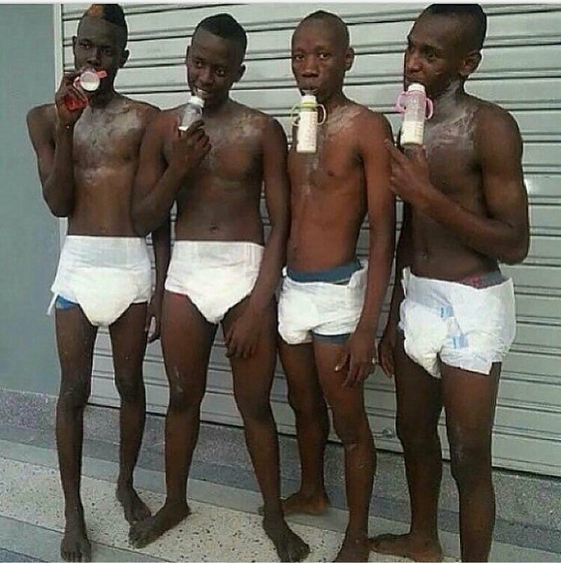 Shocking Pic Of Unclad Men Wearing Diapers & Drinking From Feeding Bottle -  Romance - Nigeria