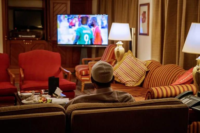 PHOTOS: President Buhari Watching Nigeria Vs Angola Match Yesterday,in