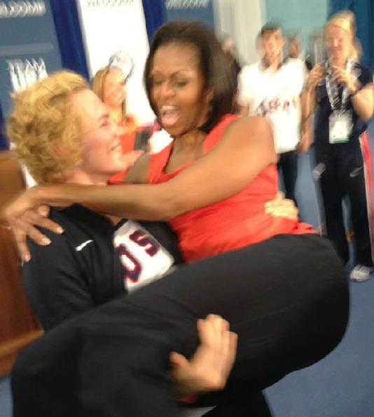 Picture Of A Wrestler Carrying Michelle Obama - Sports - Nigeria