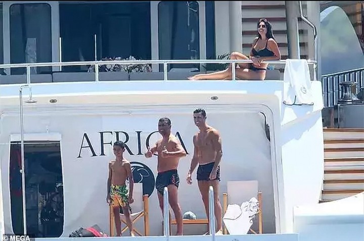 Cristiano Ronaldo and his mini-me son lark about on the $200K-a-week super  yacht
